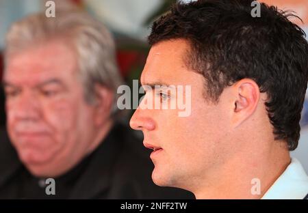 New Zealand's Dan Carter speaks with coaching staff during All Blacks  training in Sydney, Australia, Thursday, Aug. 20, 2009 ahead of their  Bledisloe Cup on Saturday, Aug. 22, 2009. (AP Photo/Rob Griffith