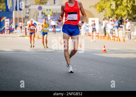 Speedwalker male racewalker walking distance in athletics competition, isolated on ...