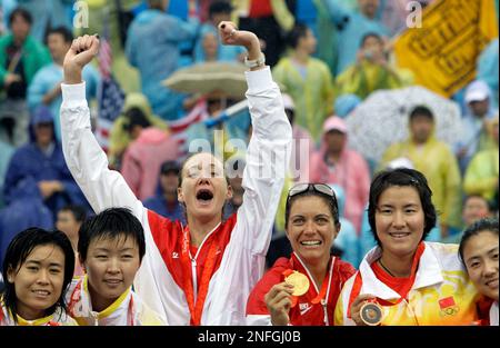 From Left, Silver Medalists Tian Jia And Wang Jie, Of China, Gold ...