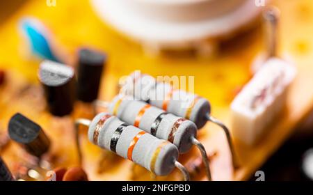 Macro Close up of components and microchips on old PC circuit board. Stock Photo