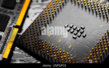 Macro Close up of RAM Memory and pins on Main CPU PC processor circuit board. Stock Photo