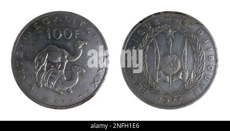 Coin of hundred francs from Djibouti minted in 1977 with a couple of camels and value on the left side, and coat of arms and date on the right side. Stock Photo