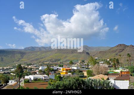 Mountains above village of Los Corralillos near Aguimes in what appears to be an old volcanic caldera, Gran Canaria Stock Photo