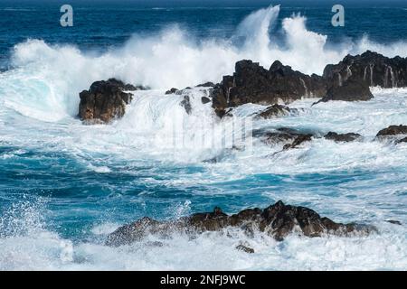 rough sea, ocean waves on rocky coast Stock Photo