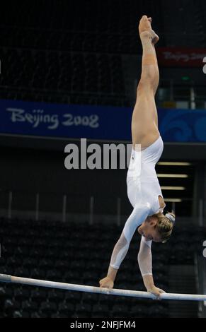 German gymnast Marie-Sophie Hindermann performs on the balance bar ...