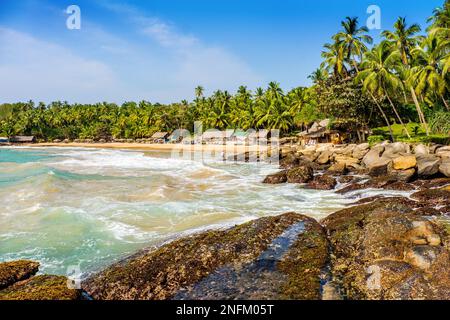 Tropical sandy beaches at Goyambokka near Tangalle on the south coast of Sri Lanka in the iNdian Ocean Stock Photo