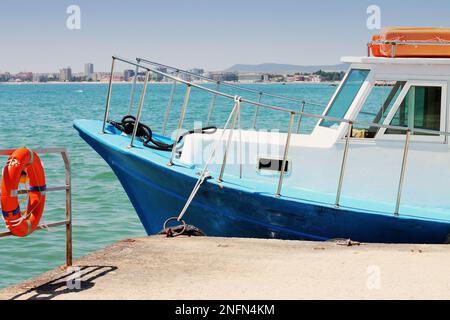 Boat stop in Sunny Beach in Bulgaria. Boat close-up on the sea background. Stock Photo