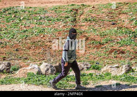 A masked Palestinian protester seen during the demonstration against Israeli settlements in the village of Beit Dajan near the West Bank city of Nablus. (Photo by Nasser Ishtayeh / SOPA Images/Sipa USA) Stock Photo