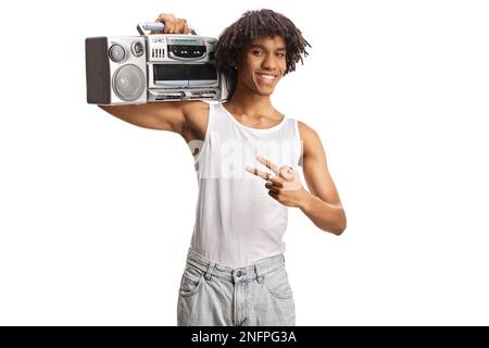 African american young man holding a boombox on shoulder  isolated on white background Stock Photo