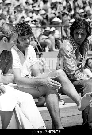 New York Jet quarterback Joe Namath stands with bowed head after being  injured in the first quarter of the Jets-Colt game at Memorial Stadium on  Sept. 23, 1973, in Baltimore, Maryland. Namath