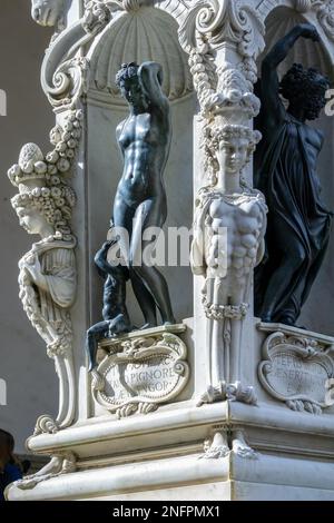 FLORENCE, TUSCANY/ITALY - OCTOBER 19 : Detail from the pedestal of the Statue of Perseus holding the head of Medusa in Florence on October 19, 2019 Stock Photo