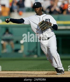 Detroit Tigers shortstop Edgar Renteria throws to first base against the  Washington Nationals in a Grapefruit League spring training baseball game  in Lakeland, Fla., Tuesday, March 18, 2008. (AP Photo/Paul Sancya Stock