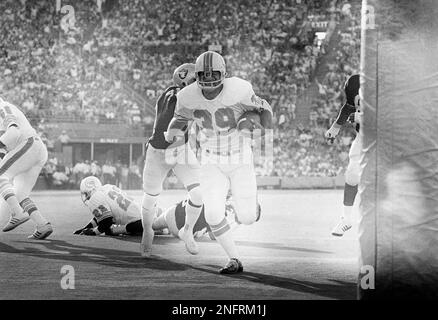 Larry Csonka, fullback for the Miami Dolphins shown in action