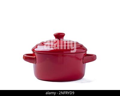 red pot french kitchen isolated white background kitchen utensil rustic traditional sweet Stock Photo