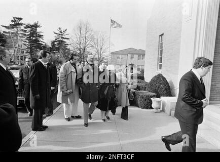 Boston Red Sox pitcher Luis Tiant, center, and his wife, Maria, walk from  the plane at Logan International Airport in Boston, mass., on arrival from  Oakland, Calif., where the Red Sox defeated