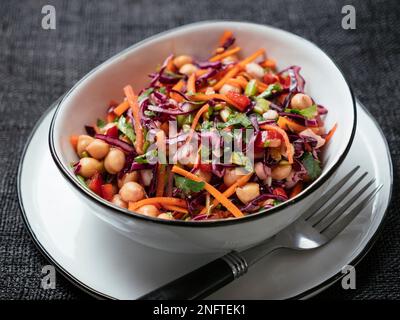 Home made chickpea slaw salad with bell peppers Stock Photo