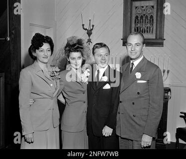 Actor Mickey Rooney second from right is shown with his bride