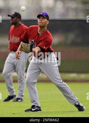 Houston Astros outfielder Jose Cruz Jr. warms up before batting