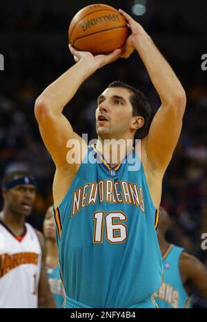 New Orleans Hornets forward Peja Stojakovic, of Serbia, looks on against  the Denver Nuggets in the third quarter of the Nuggets' 116-110 overtime  win in an NBA basketball game in Denver on