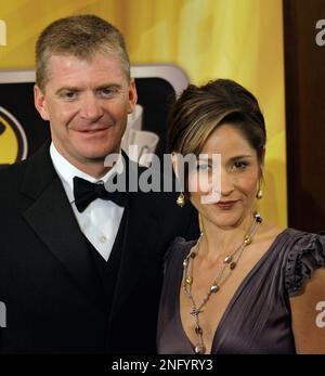 Jeff Burton and wife Kim arrive on the red carpet during the