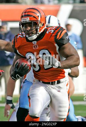 Cincinnati Bengals running back Rudi Johnson runs against the Tennessee  Titans in Cincinnati, Ohio, Aug. 23, 2003. With a record-setting game, the  low-profile running back emerged as one of the Bengals' most