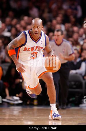 New York Knicks guard Stephon Marbury brings the ball up the court