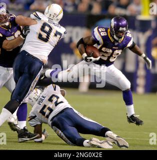 Minnesota Vikings' Matt Birk (78) and Steve Hutchinson chat during the  first day of football training camp at Minnesota State University, Mankato,  in Mankato, Minn., Friday, July 27, 2007. (AP Photo/Nati Harnik