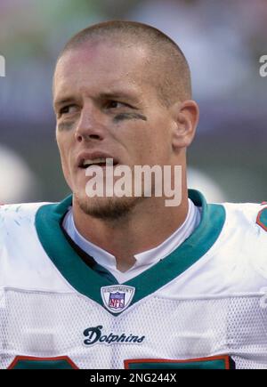 Tempe, United States. 27th Oct, 2003. San Diego Chargers tight end Justin  Peelle is attended to on field for injury by trainer James Collins and team  doctor David Chao. The Miami Dolphins