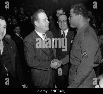 Famous boxer Joe Louis after an exhibition of his skills in London, England  on 22 June 1944