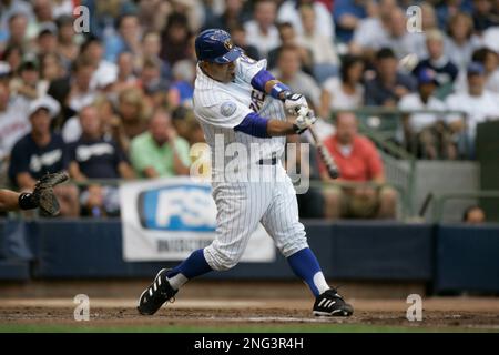 Milwaukee Brewers' Johnny Estrada hits a grand slam during the