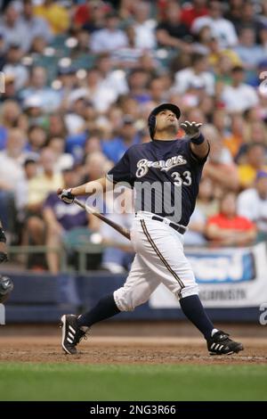 Milwaukee Brewers' Johnny Estrada hits a grand slam during the