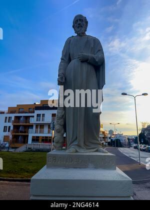 Nitra, Slovakia -01.29.2023: Statue of the Evangelist Apostle Matthew in the historic center of the city. Stock Photo