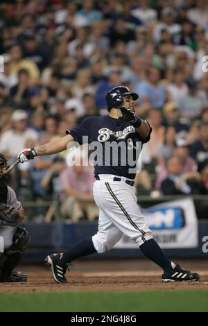 Milwaukee Brewers' Johnny Estrada hits a grand slam during the