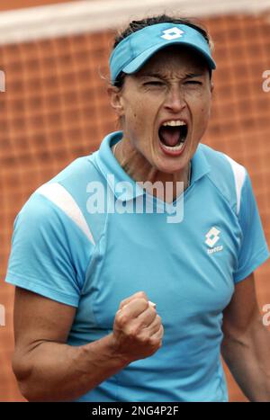 Italy's Tathiana Garbin reacts after winning a point to Japan's Akiko Morigami, during their first round match of the French Open tennis tournament, at the Roland Garros stadium, in Paris, Monday, May 28, 2007. (AP Photo/Michel Spingler)
