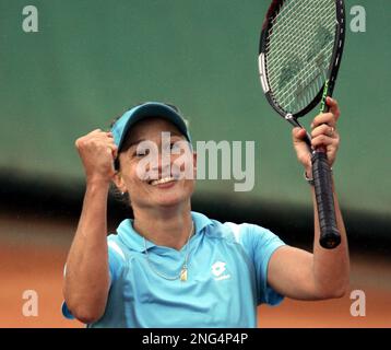 Italy's Tathiana Garbin reacts after beating Japan's Akiko Morigami, during their first round match of the French Open tennis tournament, at the Roland Garros stadium, in Paris, Monday, May 28, 2007. Garbin won 7-6, 6-4. (AP Photo/Michel Spingler)