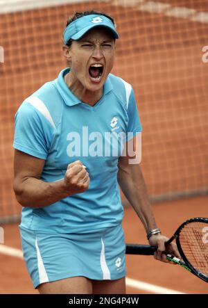 Italy's Tathiana Garbin reacts after winning a point to Japan's Akiko Morigami, during their first round match of the French Open tennis tournament, at the Roland Garros stadium, in Paris, Monday, May 28, 2007. (AP Photo/Michel Spingler)