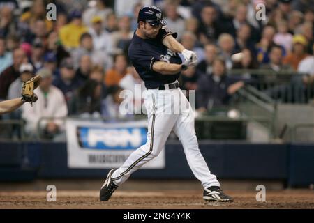 Milwaukee Brewers J.J. Hardy gets a fist with thumbs up from first base  coach Eddie Sedar after hitting a two run RBI single off of St. Louis  Cardinals pitcher Todd Wellemeyer in