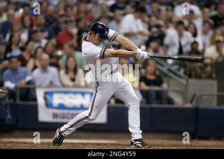 Milwaukee Brewers J.J. Hardy gets a fist with thumbs up from first base  coach Eddie Sedar after hitting a two run RBI single off of St. Louis  Cardinals pitcher Todd Wellemeyer in