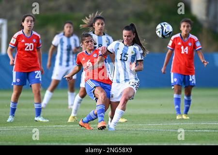 Auckland, New Zealand. 17th Feb, 2023. Gisela Pino (L) of Chile National Women's soccer team and Florencia Bonsegundo of Argentina National Women's soccer team seen in action during the FIFA Women's World Cup 2023 Playoff held at the North Harbour Stadium. Final score; Argentina 4:0 Chile Credit: SOPA Images Limited/Alamy Live News Stock Photo