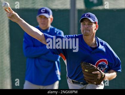 Former Chicago Cubs pitcher Kerry Wood acknowledges the crowd