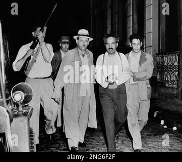 https://l450v.alamy.com/450v/2ng6f2f/pedro-albizu-campos-president-of-the-puerto-rican-nationalists-was-routed-from-his-besieged-home-at-san-juan-puerto-rico-nov-2-1950-by-police-using-teargas-he-surrendered-without-a-shot-being-fired-and-was-whisked-to-headquarters-for-questioning-hours-after-the-washington-attempt-on-the-life-of-president-truman-other-top-leaders-of-the-nationalist-and-communist-parties-were-taken-in-a-widespread-roundup-campos-headed-a-nationalist-uprising-in-puerto-rico-which-started-oct-30-ap-photo-2ng6f2f.jpg
