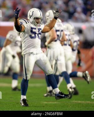 Jacksonville Jaguars tight end Brian Jones (86) pulls in a 41 yard pass  reception in front of Indianapolis linebacker Gary Brackett (58). The  Indianapolis Colts defeated the Jacksonville Jaguars 10-3 at the