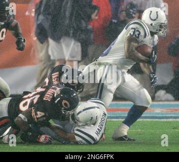 Chicago Bears cornerback Nathan Vasher (31) returns an interception 45  yards for a touchdown as Brian Urlacher (54) celebrates during the fourth  quarter on December 4, 2005 at Soldier Field in Chicago.