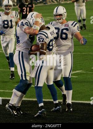 Indianapolis Colts receiver Ben Utecht, right, fumbles the ball as he is  tackled by Seattle Seahawks defender Julian Peterson in the first quarter  of an NFL preseason football game in Indianapolis Sunday