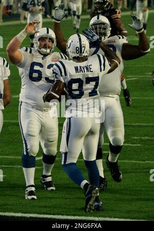 Indianapolis Colts Tackle Tarik Glenn (78) Lifts The Lombardy Trophy In 