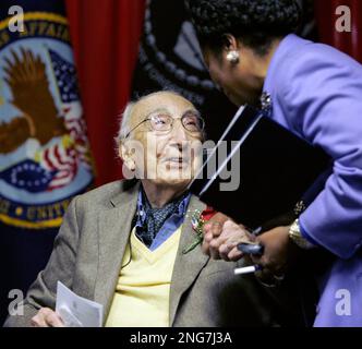 Dr. Michael E. DeBakey, famous heart specialist, talks to high school ...