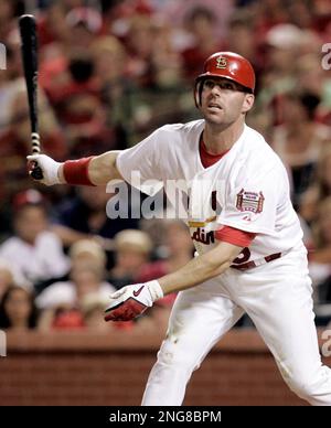 St. Louis Cardinals Jim Edmonds watches his two run home run leave the park  for the lead in the seventh inning at Busch Stadium in St. Louis on August  22, 2007. St.