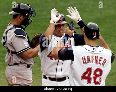 Cleveland Indians' Victor Martinez waits for play to resume