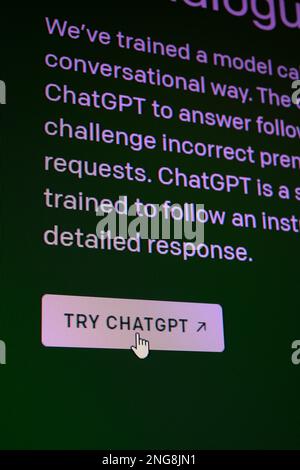ZhongShan China-Feb 15,2023:close up of a monitor showing a mouse cursor about to hit the try ChatGPT button at vertical compsition. Stock Photo