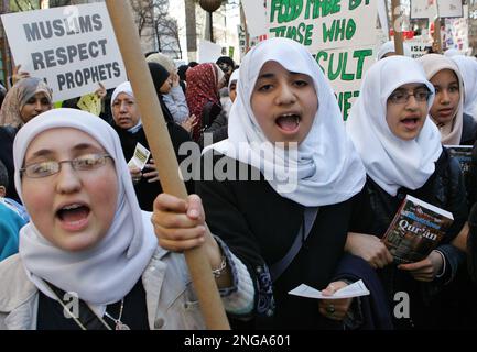 A group organized by a Muslim leader protests cartoons published by a ...